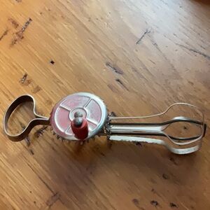 Antique Child’s Red and Silver Hand Mixer metal